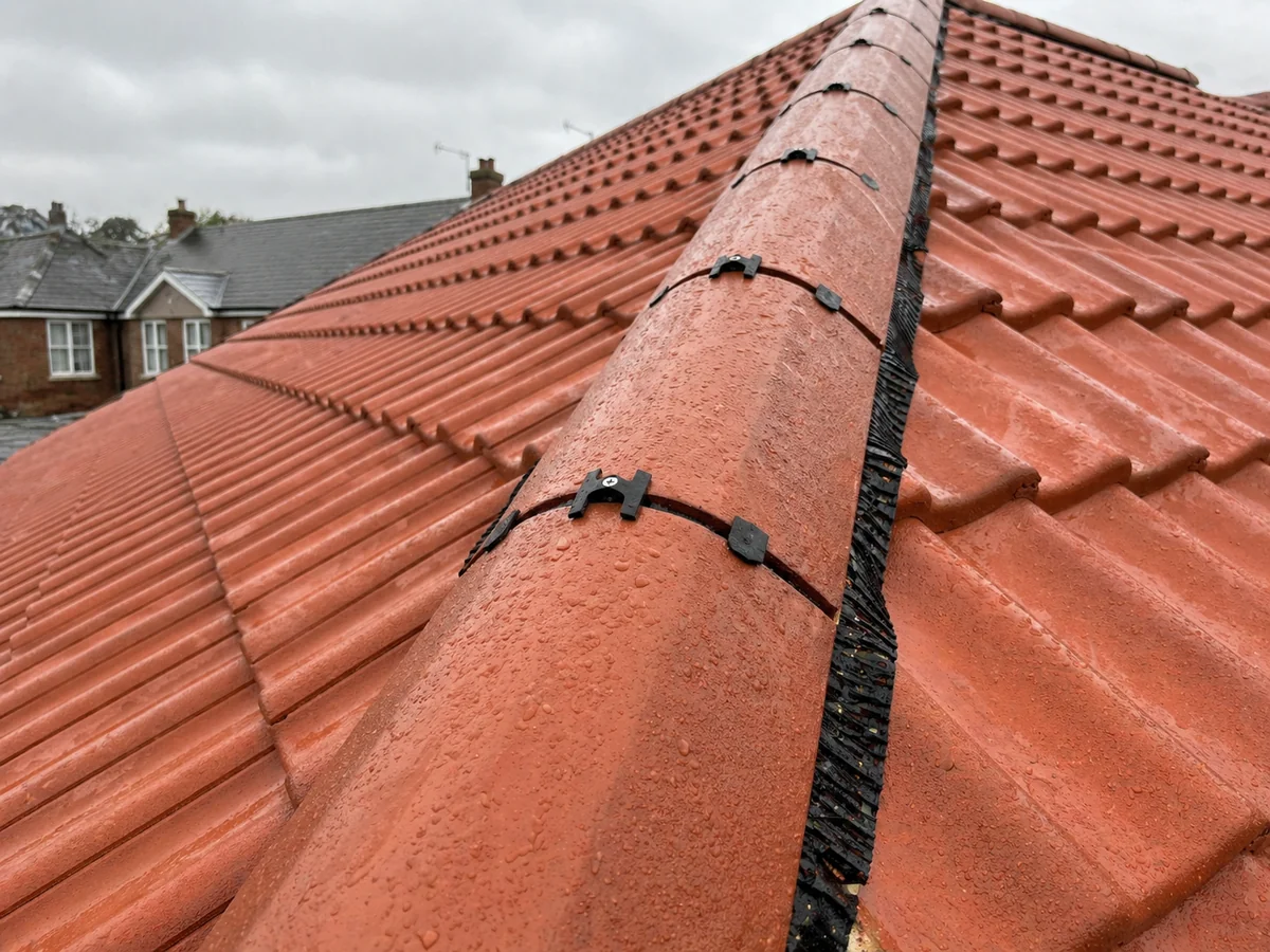 Dry ridge ridge-tile system being installed on a Stowmarket pitched roof